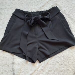 C.F.H. Collection Front Tie Black Dressy shorts with pockets Sz Small Fancy Chic